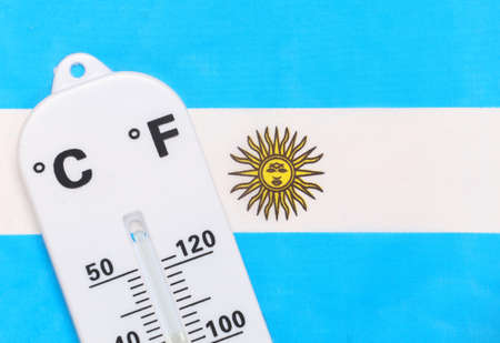 National Ambient Temperature Control. Weather thermometer on background of Argentina flag. Global...