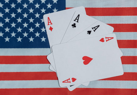 Four aces on the background of the USA flag.の写真素材