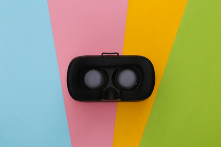 VR headset on colored background. virtual reality. flat lay. top view