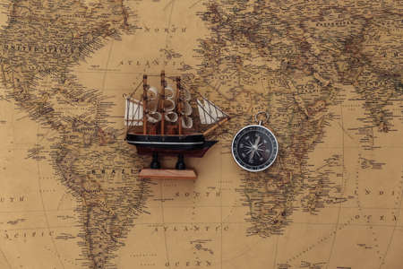 Compass and ship on old map. Travel, adventure conceptの写真素材