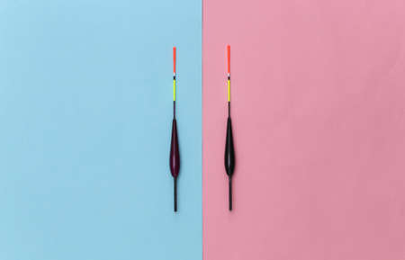 Two Fishing floats on pink blue pastel background. top view. minimalismの写真素材