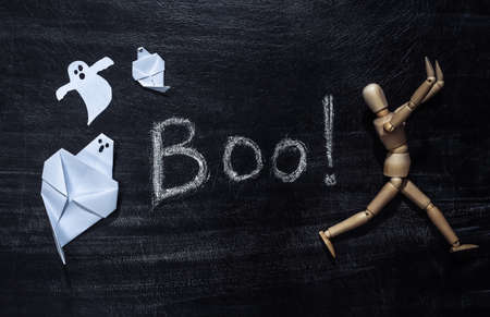 Chalk Lettering Boo! on a chalk board with halloween decor. Halloween themeの写真素材