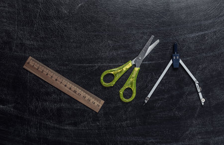 School supplies on the blackboard. top viewの写真素材