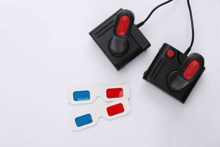 Retro joysticks, 3d glasses on white background. retro gaming. Stereo Video game, 80s.