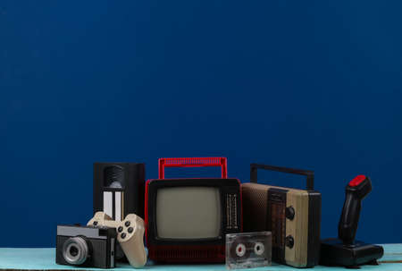 Retro portable mini tv set with headphones, radio receiver, joystick, camera, gamepad, audio and...
