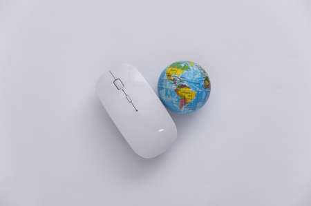 global network. Pc mouse and globe on white background. Online business, shopping. top view. flat...