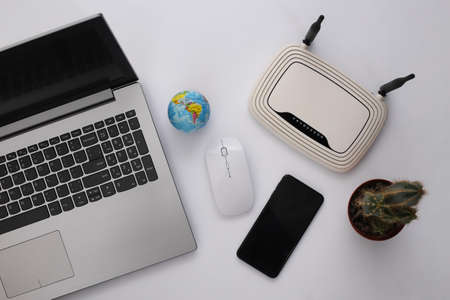 Modern workspace on a white background. studio shot. top viewの写真素材