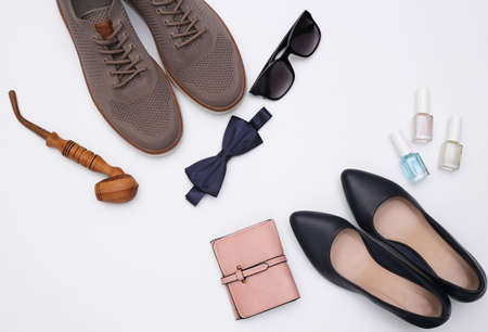 Gentlemen and lady shoes and accessories on a white background. top viewの写真素材