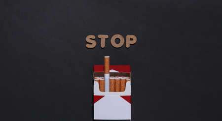 Stop smoking. Pack of cigarettes on black backgroundの写真素材