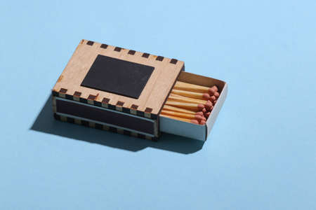 Box of matches on a blue background