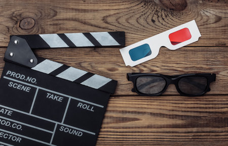 Retro cameras with 3d glasses on wooden background. top viewの写真素材