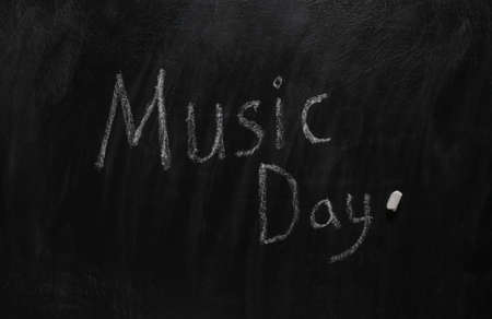 Words music day chalk hand drawn on blackboardの写真素材