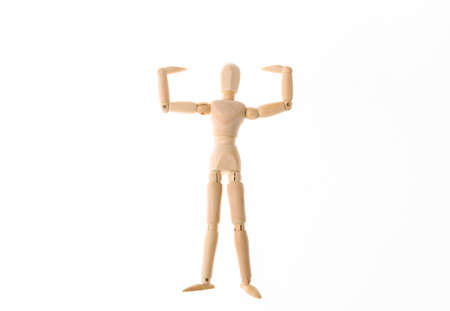 Wooden puppet mannequin showing muscles isolated on white background