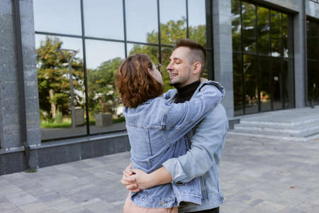 Charming young modern stylish couple in urban city outdoors