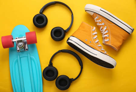 Youth hipster outfit on a yellow background. flat lay. top viewの写真素材