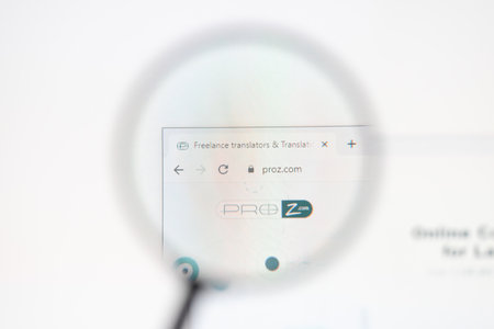 Odessa, Ukraine - December 17, 2020: Proz.com website on monitor screen under magnifying glass.