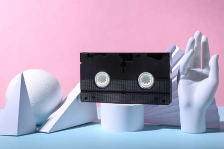 Retro Video cassette and geometric shapes on blue pink pastel background. minimalism. 80s. Abstract background, concept artの写真素材