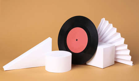 Vinyl record and geometric shapes on a beige background. concept art. Retro 80sの写真素材