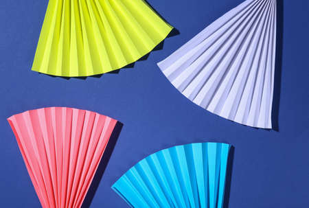 Abstract modern background. Paper fan on blue background. Concept art, minimalismの写真素材
