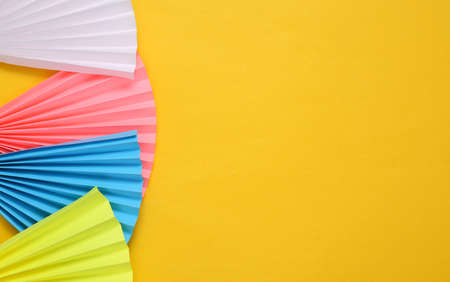 Abstract modern background. Paper fan on yellow background. Concept art, minimalismの写真素材