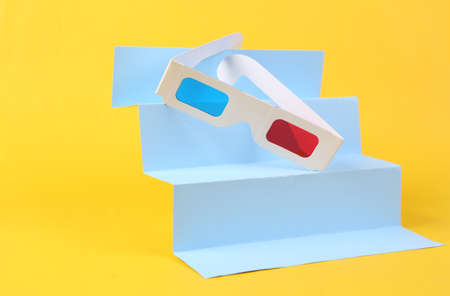 3D glasses on stairs, yellow background. Concept art, minimalismの写真素材