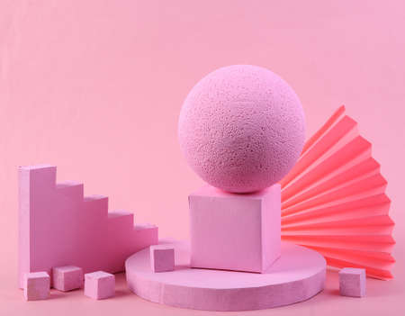 Scene with geometric shapes. pink background. Pastel color trend. minimalism. Creative composition, still lifeの写真素材