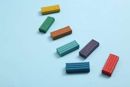 Colored plastic on a blue backgroundの写真素材