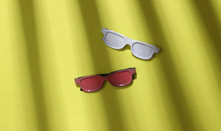 Glasses on green background with trendy fashion striped shadow. minimalism. abstraction. concept artの写真素材