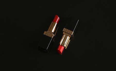 Red lipsticks on black backgroundの写真素材