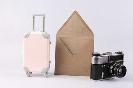 Travel attributes and envelope on white backgroundの写真素材