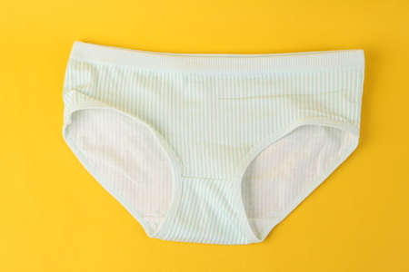Panties on a yellow backgroundの写真素材