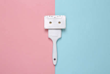 Audio cassette brush on blue pink pastel background, Creative layoutの写真素材