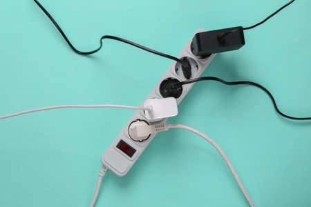 Electrical Extension cord with different plugs and adapters. top view