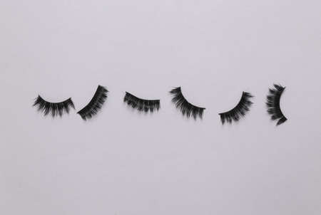 False eyelashes on a gray background. beauty concept