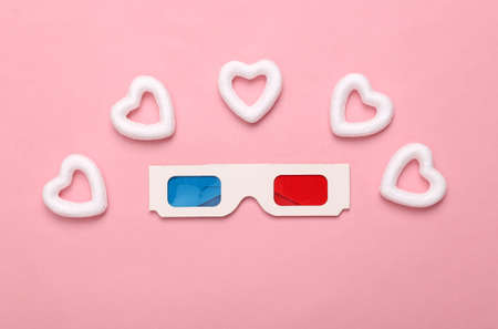3d glasses with white hearts on a pink background. creative layout. Love concept, happy valentines...