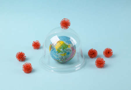 Minimalistic still life. Globe under the Dome protecting from virus strain moleculesの写真素材