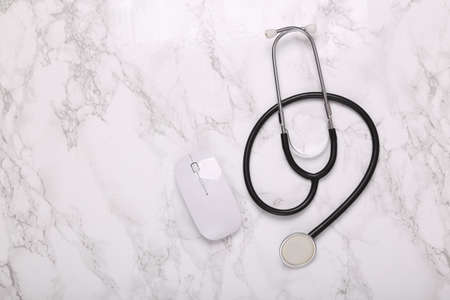 Stethoscope on marble background. top viewの写真素材
