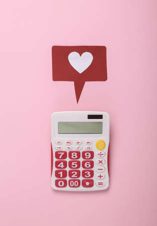 Calculator and like notification icon on a pink background. social media. Rating, followers feedback. top viewの写真素材