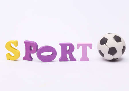 Word sport from colored letters with soccer ball isolated on white backgroundの写真素材