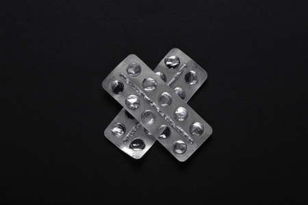 Blank blister of pills on black backgroundの写真素材