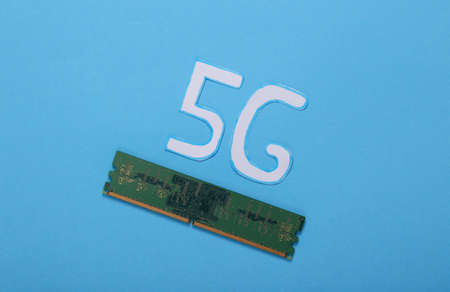 5G technology. Microchip and 5g iicon on blue backgroundの写真素材