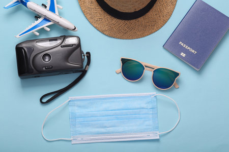 The concept of travel during the period of coronavirus or other pandemic and quarantine. Flat lay travel accessoriesの写真素材
