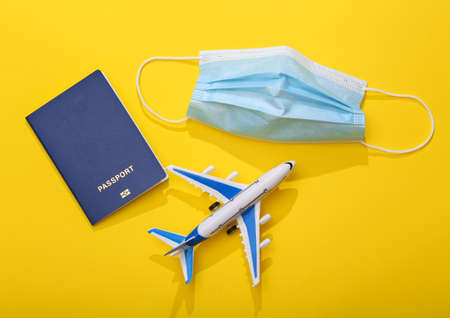 Concept of travel during the period of coronavirus or other pandemic and quarantine. Flat lay travel...