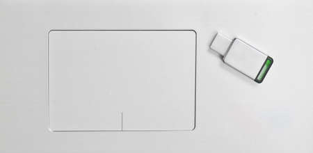 USB flash drive on laptop keyboard. Modern media technologies.の写真素材