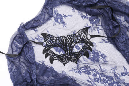 Lace mask of a cat with a nightie on a white background. Romantic, love conceptの写真素材