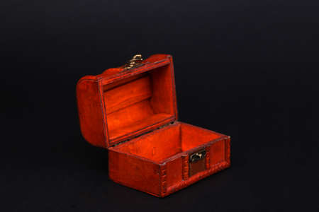 Red Pirate chest isolated on black backgroundの写真素材