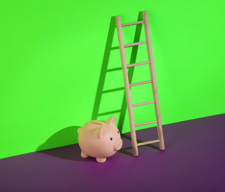 Wooden ladder and piggy bank on a green-purple background. minimum layout. Business, leadership concept, career growthの写真素材