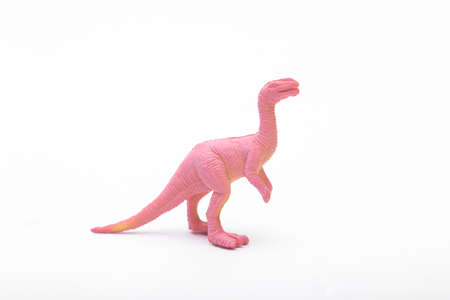 Toy pink dinosaur isolated on white backgroundの写真素材