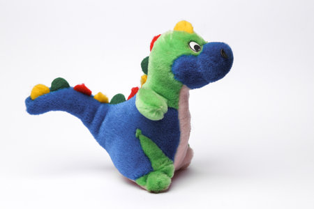 Plush dinosaur isolated on white backgroundの写真素材
