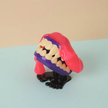 Halloween clockwork monster in slime, pastel background
